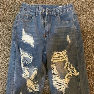 Distressed Blue Jeans